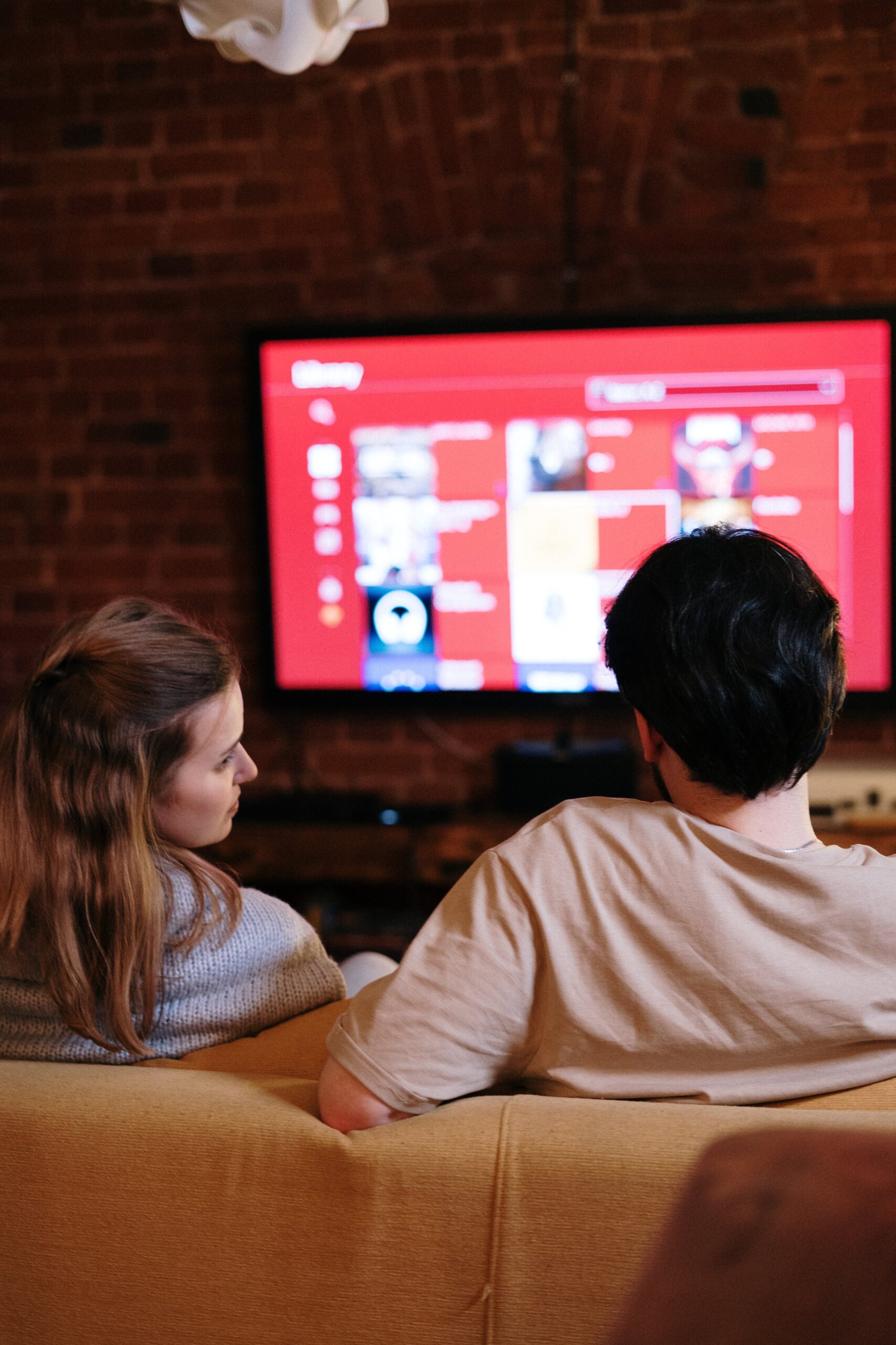 couple watching something on a smart tv